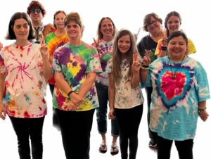 Arts4All Singers in tie-dyed shirts